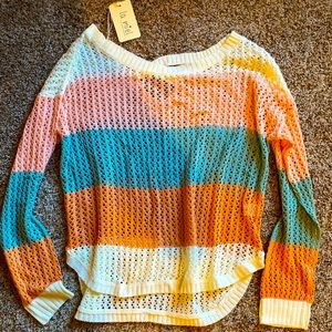 New with tags color block sweater, size S and M